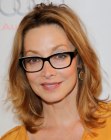 Sharon Lawrence's shoulder length hair with styling for volume