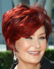 Sharon Osbourne with short red hair