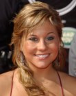 Shawn Johnson's hair brought back and styled into a coiled ponytail