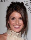 Shenae Grimes wearing her hair in an updo with a simple ponytail