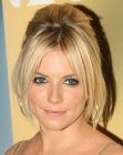 Sienna Miller with her hair up