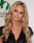 Stacy Keibler with her layered hair styled into large waves