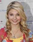 Stefanie Scott wearing her blonde hair long with curls