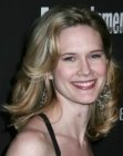 Stephanie March with long curly hair