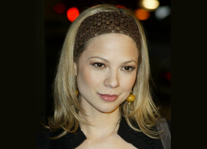 Tamara Braun wearing a hair band in her hair