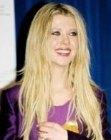 Tara Reid with very long layered hair