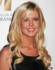 Tara Reid's long blonde hair with spiral curls