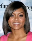 Taraji Henson's long bob with bangs and texturing