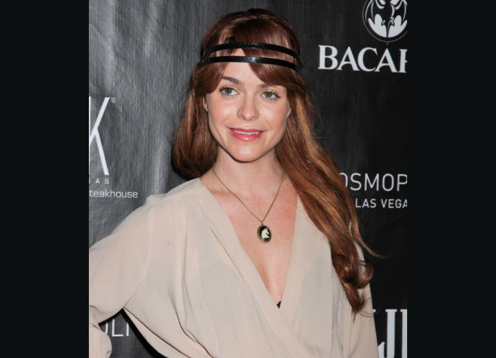 Taryn Manning with her hair captured in leather bands