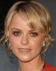 Taryn Manning sporting short hair with side bangs