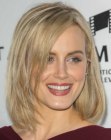 Taylor Schilling's medium length hair with layering around the face
