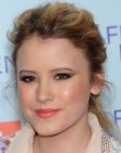 Taylor Spreitler's boho-chi up-style with loose waves