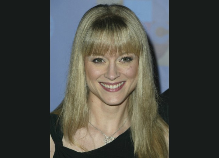 Teri Polo with long straightened hair