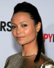 Thandie Newton's hairstyle with volume on the crown and a high ponytail
