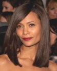 Thandie Newton's long blunt cut hair with the top angled over to one side