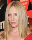 Toni Collette's sleek shoulder length hair with sharp ends and middle parting