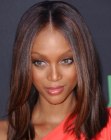 Tyra Banks wearing her straight hair in a long blunt cut