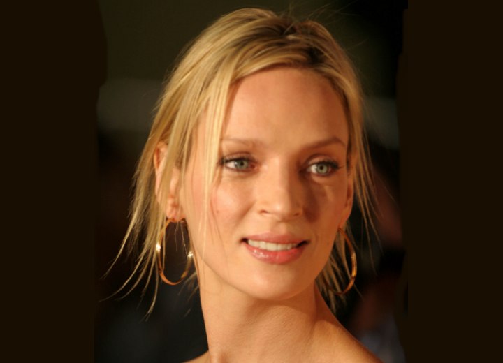 Uma Thurman with her hair up