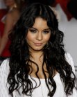 Vanessa Hudgens sporting a gypsy look with very long wavy hair