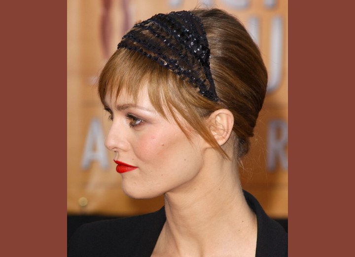 Vanessa Paradis wearing her hair up with a headband