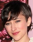 Zelda Williams with her hair cut short and above her ears