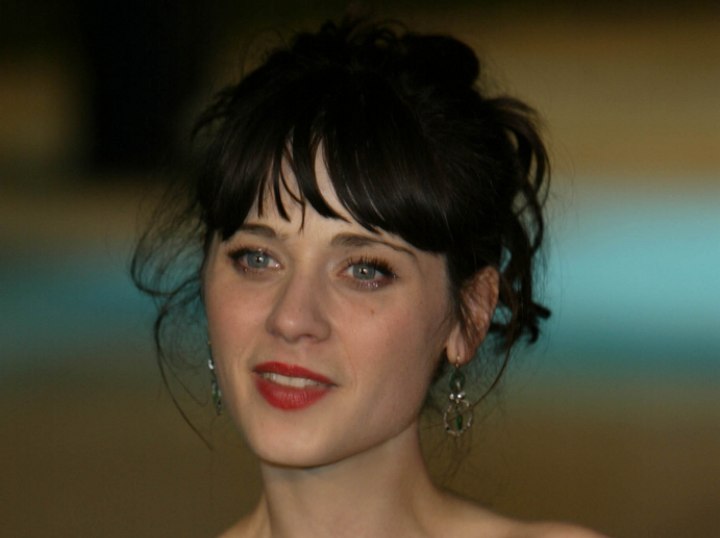 Zooey Deschanel wearing her hair in an upswing