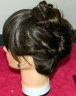 Recogido alto con flequillo