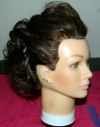 Recogido alto con rizos suaves