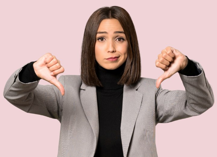 Young fashionable woman with a turtleneck, blazer and a long bob haircut