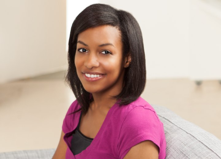 African teenager with shoulder-length hair