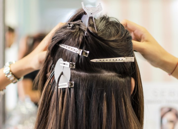 Applying hair extensions