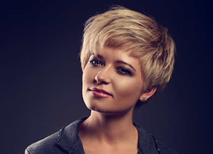 Assymetrical pixie haircut with layers and short bangs