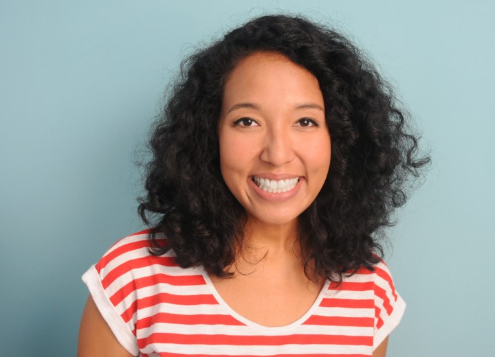 Asian lady with curly shoulder-length hair