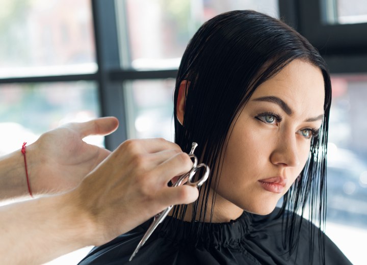 Hair stylist cutting a bob