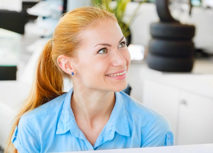 Woman with a faded red hair color