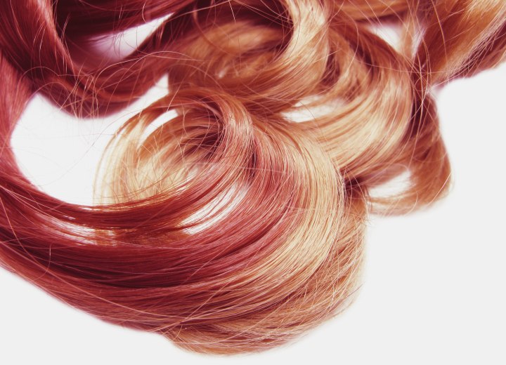 Shedding of red hair color and fade of darker colors