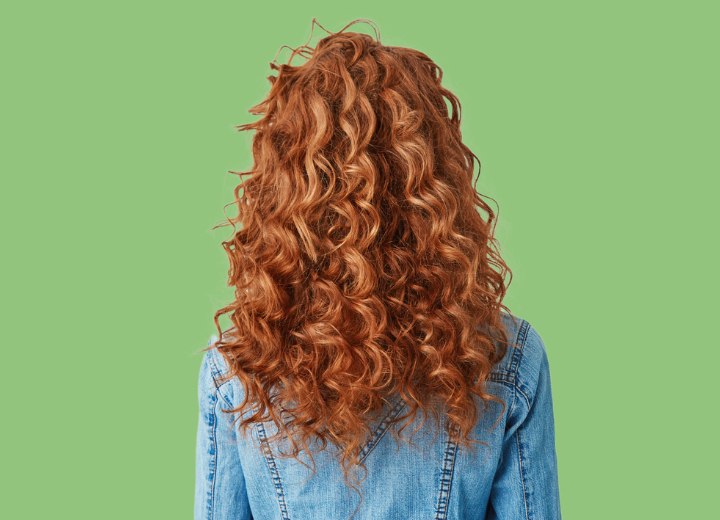 Long hair with spiral perm curls