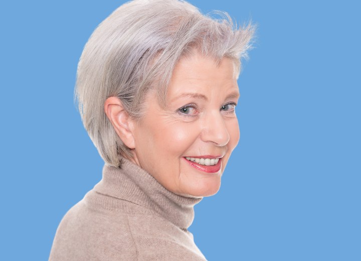 Stylish older woman with short gray hair