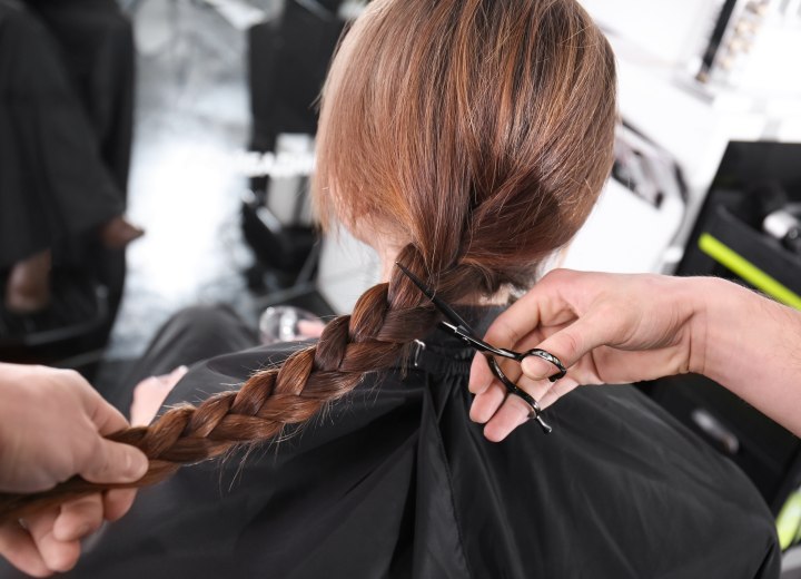 Cuting a ponytail for a St. Baldrick's headshave