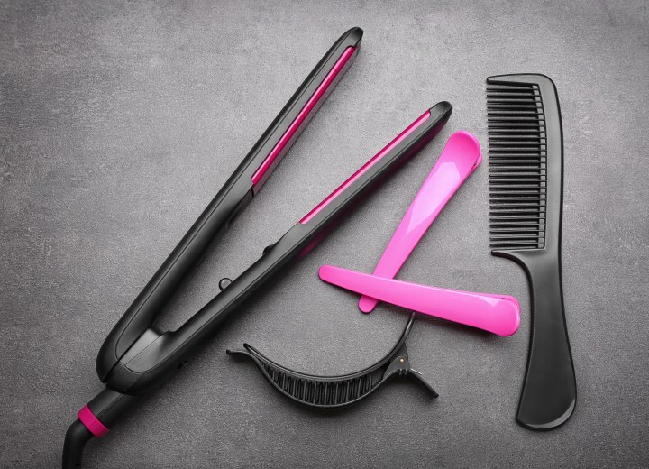 Flat iron, hair clips and a comb