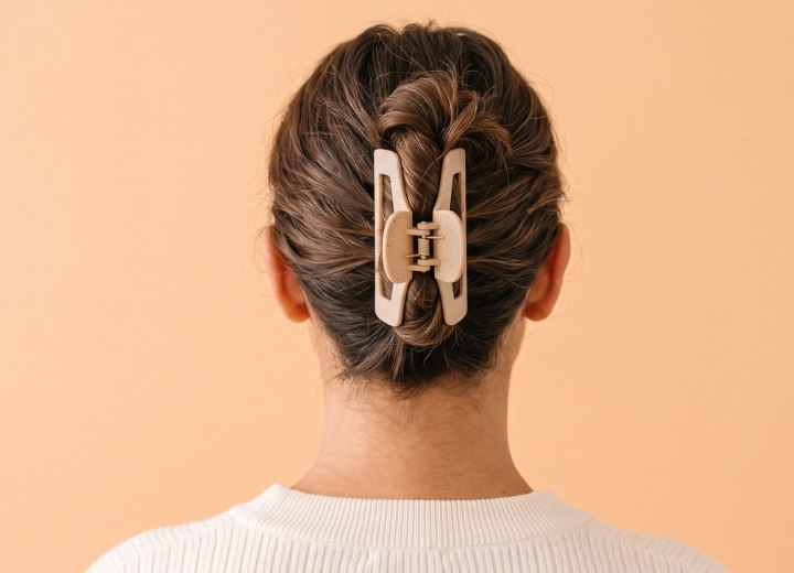 Hair styled with a claw clip