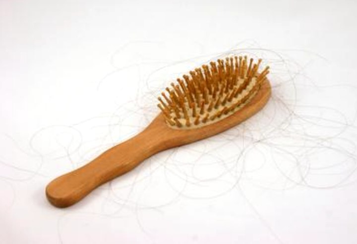 Brush with long strands of hair