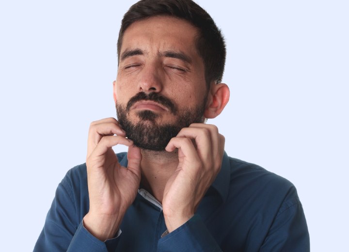 Man with an itchy beard