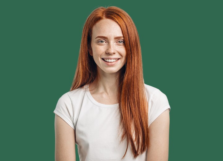 Young woman with long red hair