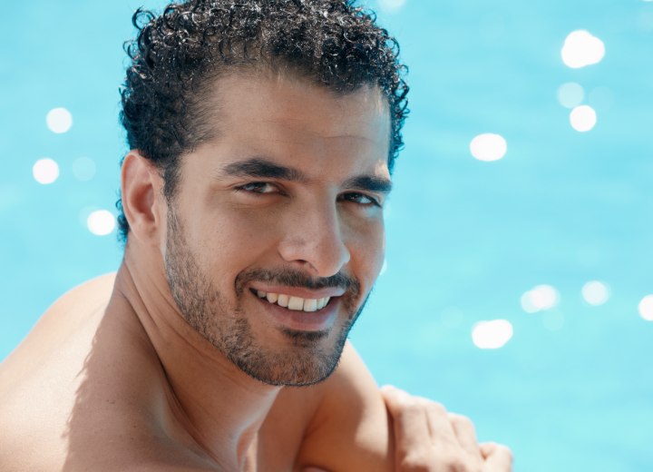 Man with short permed hair