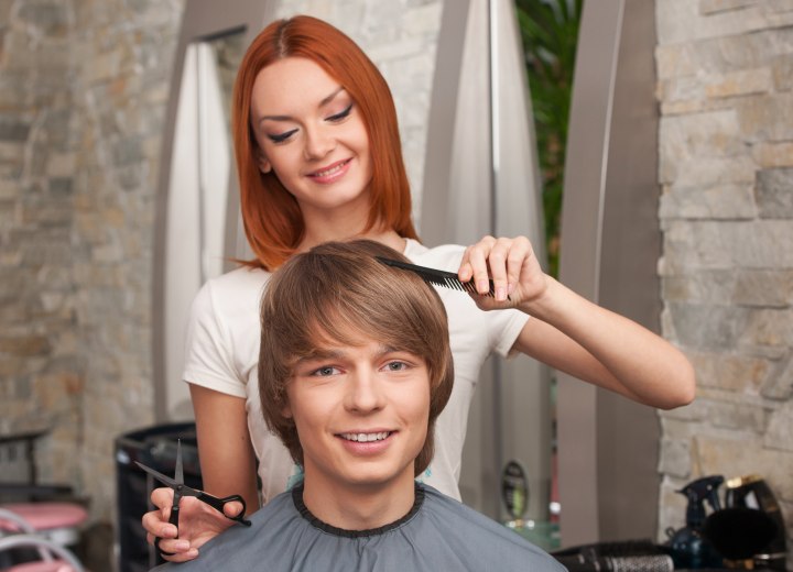 Young man getting a new haircut