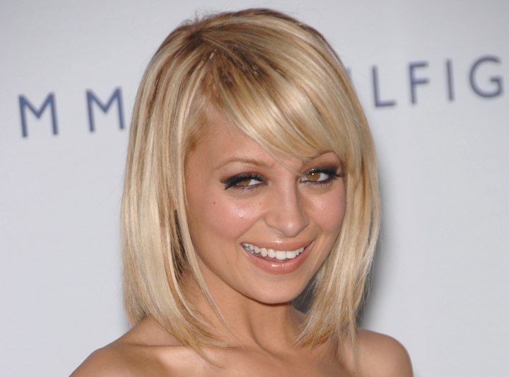 Cut hair like Nicole Richie's with a round face shape