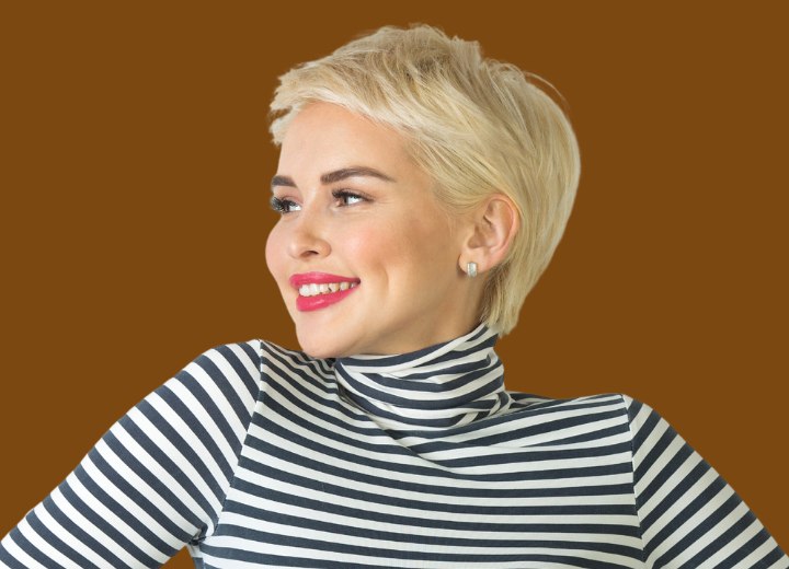 Not boring short blonde hair and a striped turtleneck