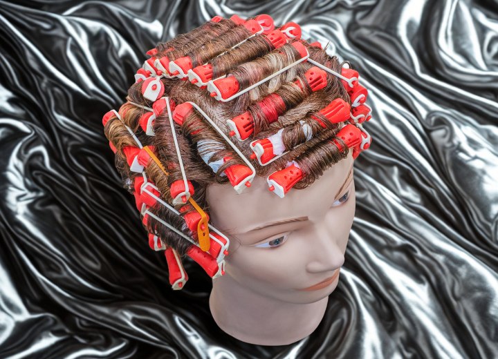 The permanent waving process with perm rods for hair