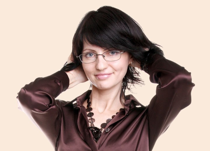 Woman wearing a brown satin blouse
